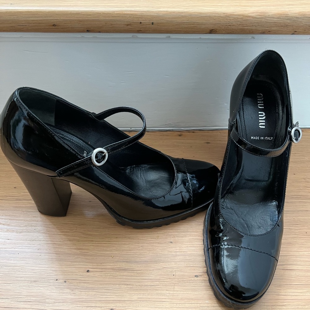 Brand New Miu Miu Patent Leather Mary Janes with a light lug sole. ~4in heel